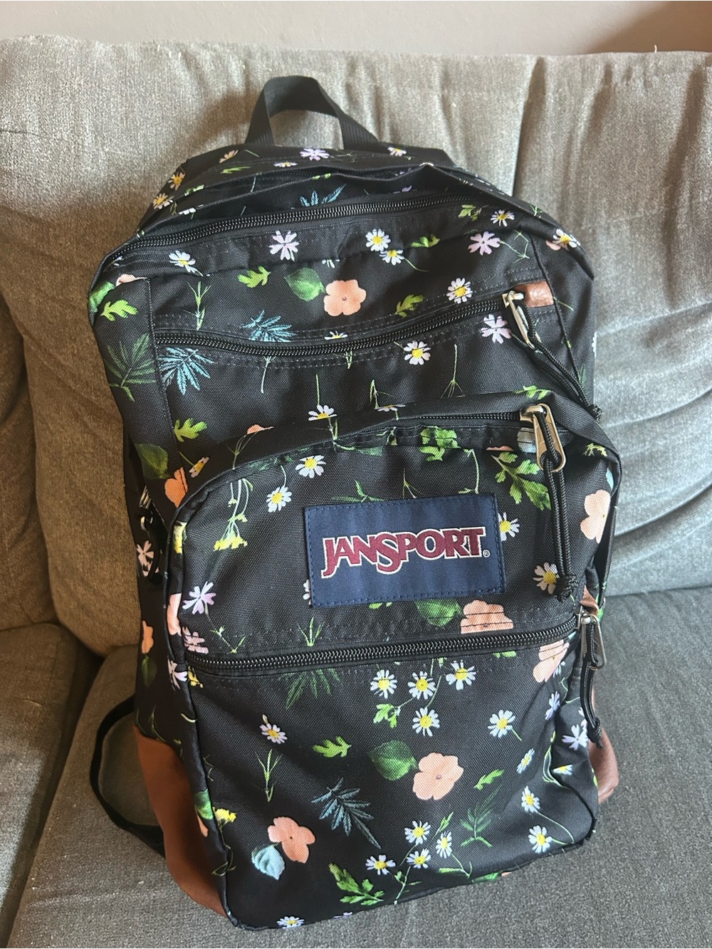 Jansport Black Floral Backpack with Peach and Green Accents
